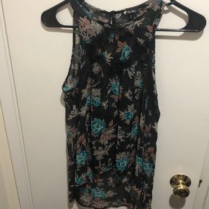 Floral blouse with lace detail on black and blue